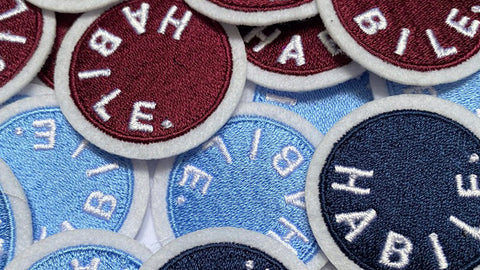voici nos badges HABILE avec qu'il ne soient monter sur nos modèles